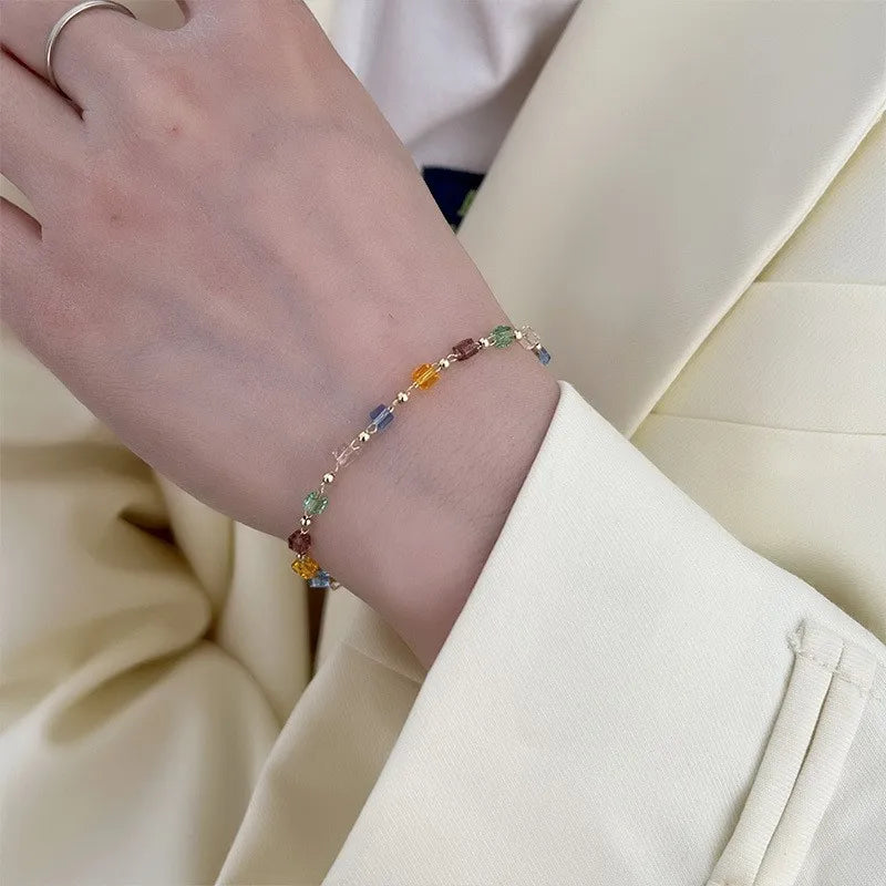 Collier et bracelet à strass incrustés d'émeraude