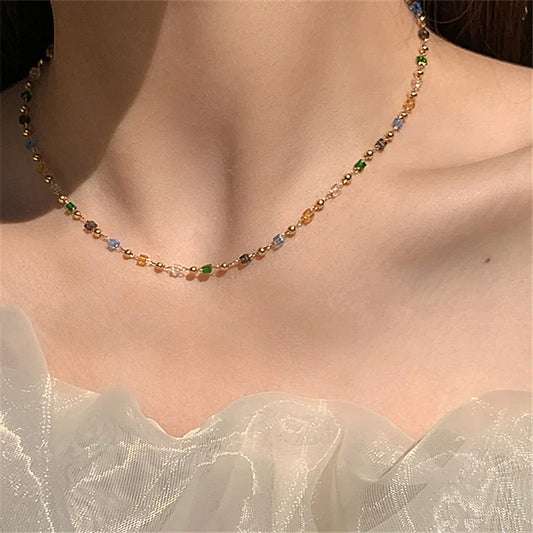 Collier et bracelet à strass incrustés d'émeraude